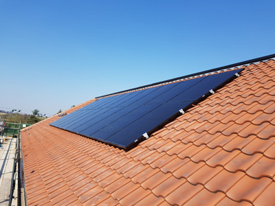A small solar installation on a tiled roof at Bardwell Pavilion