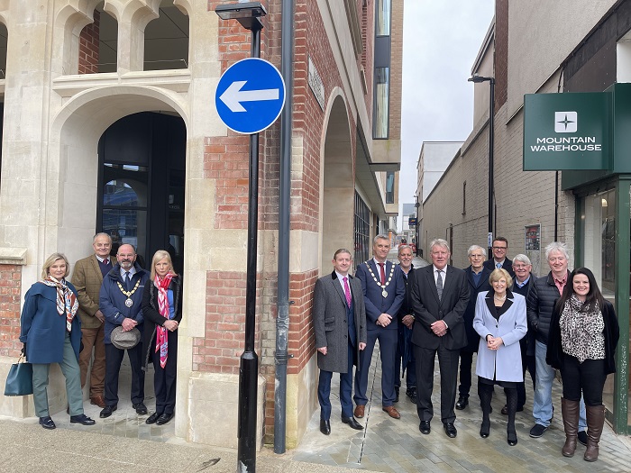 The entrance to Cornhill includes a new archway. West Suffolk Councillors, New Anglia Local Enterprise Partnership and members of the Bury St Edmunds Town Centre Masterplan Advisory Group mark the opening of the wider Market Thoroughfare