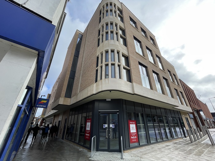 The project has turned an unattractive yard area at the back of the old Post Office into a new commercial front onto St Andrews St South. 