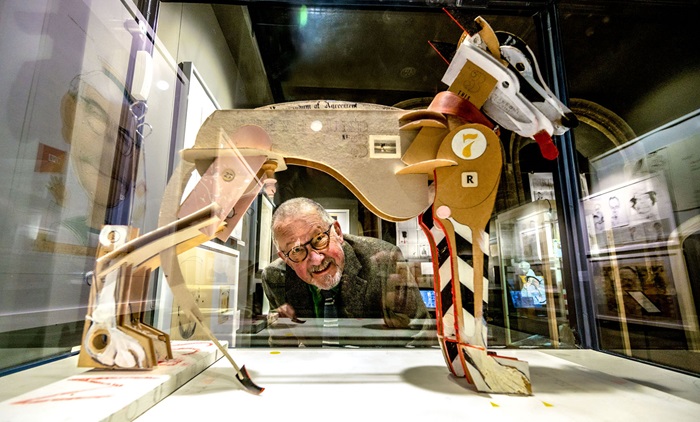 Internationally acclaimed illustrator David Hughes with one of his pieces on display at Moyse's Hall Museum. Photo Credit Geoff Price