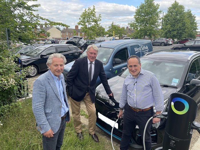 The new electric vehicle chargers in St Andrews car park in Bury St Edmunds can be used by residents to charge vehicles overnight. Resident Tim Page is pictured with council leader Cllr John Griffiths and Cabinet Member for Environment Cllr Andy Drummond