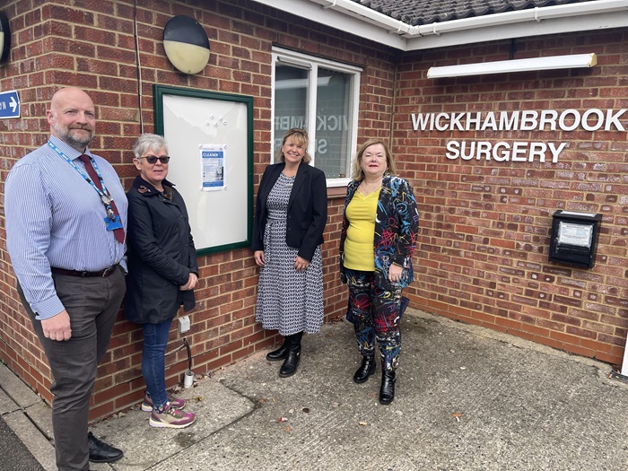 Wickhambrook noticeboard at Wickhambrook Surgery Andy Botcher, practice manager at Wickhambrook Surgery with Parish Cllr Tracey Cann, Donna Goodall, patient services manager at Wickhambrook Surgery, and West Suffolk Cllr Sarah Pugh