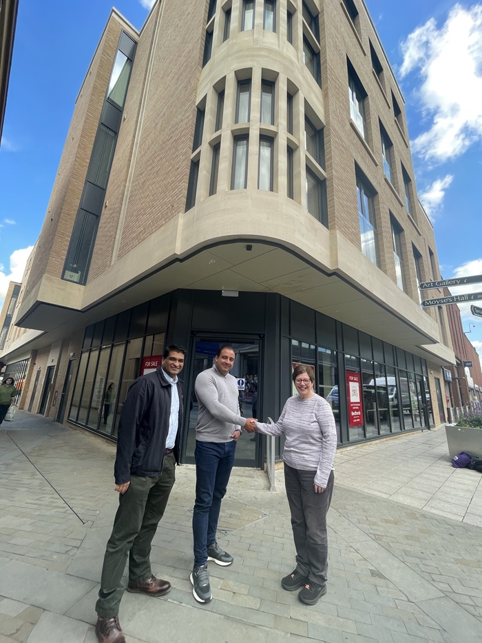 Cllr Indy Wijenayaka, Ross Walker and Cllr Diane Hind outside the St Andrews St South unit in Bury St Edmunds which is to become independent cafe Amici