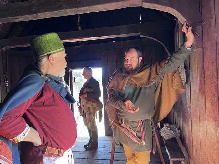 The Wulfheodenas, an international living history group that meticulously researches early Anglo-Saxon life and recreates the weaponry, crafts, and clothing. Here they show how people dressed as they talk in a hall The Wulfheodenas, an international living history group that meticulously researches early Anglo-Saxon life and recreates the weaponry, crafts, and clothing. Here they show how people dressed as they talk in a hall