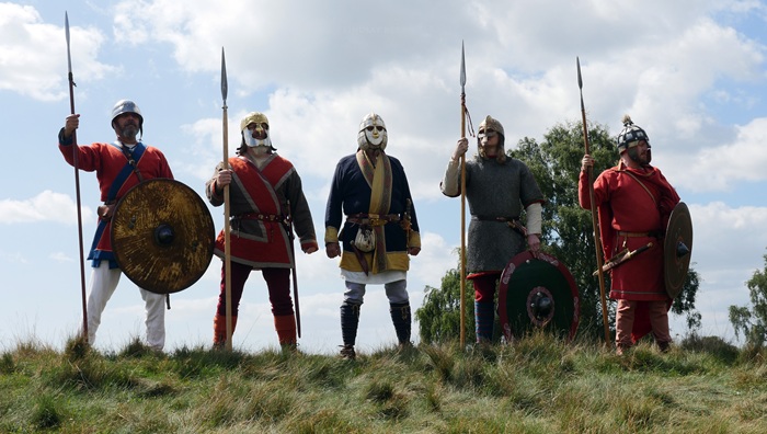 The Wulfheodenas, an international living history group that meticulously researches early Anglo-Saxon life and recreates the weaponry, crafts, and clothing. The photo shows warriors The Wulfheodenas, an international living history group that meticulously researches early Anglo-Saxon life and recreates the weaponry, crafts, and clothing. The photo shows warriors