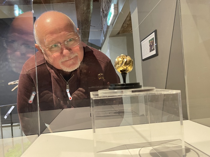 Cllr Ian Shipp, West Suffolk Council's Cabinet Member for Leisure and Culture looks at an original Golden Snitch prop from Harry Potter and the Philosopher’s Stone on display at Moyse's Hall Museum in Bury St Edmunds
