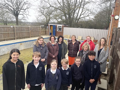Rougham Primary School save our pool campaigners with West Suffolk Cllr Sara Mildmay-White.