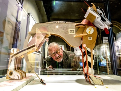 Illustrator David Hughes with one of his pieces on display at Moyse's Hall Museum Photo Credit Geoff Price