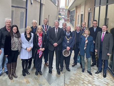 West Suffolk Councillors, New Anglia Local Enterprise Partnership and members of the Bury St Edmunds Town Centre Masterplan Advisory Group mark the opening of the wider Market Thoroughfare