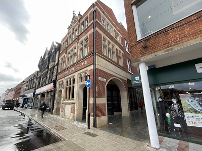 The redevelopment brings the Victorian Cornhill front back into economic use while improving access and replacing windows to improve energy efficiency. It has also widened Market Thoroughfare by over 50 percent at ground floor level