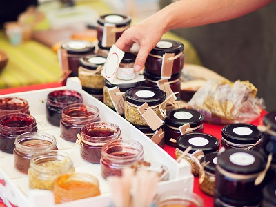 Honey and jam in jars at the market
