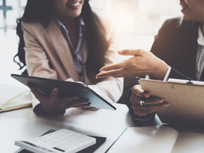 Two people in a business meeting