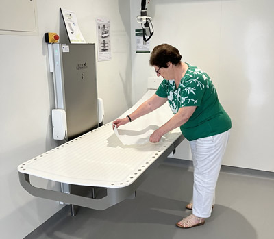 Cllr Hind in new Changing Places facility at Guineas toilets 400x300