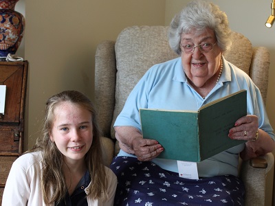 Elinor Hurry, 13, from St Benedict's Catholic School with 101-year-old Eleanor (Beanie) Wadsworth from Bury St Edmunds who flew Hurricanes and Spitfires in World War Two as they were transported from manufacturers to airfields.
