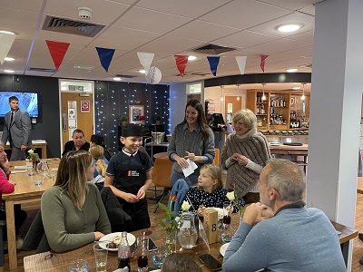 Junior Chef with their family