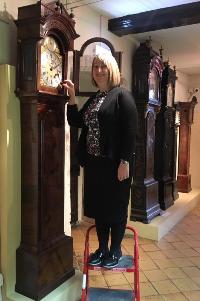 Jo Rayner winding Simon de Charmes clock