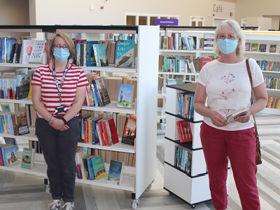 Mildenhall Hub's first customer Allison Higgins with Kate Ashton, executive library manager