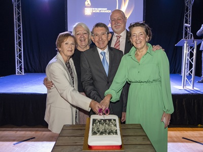 Staff who worked at the leisure centre when it opened cut a 50-year celebratory cake cropped. Photo credit: Simon Lee Photography. icon