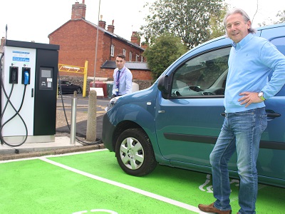 Cllr Andy Drummond, who represents the Newmarket West ward and is West Suffolk Cabinet Member for Regulatory, with Environment officer Matthew Axton, charging an EV at the new Rapid Charger in Newmarket.