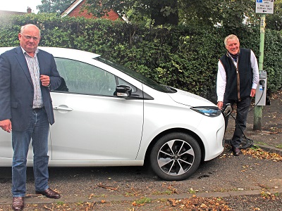 SCC Cabinet Member for Highways, Transport and Rural Affairs Andrew Reid with WSC Leader Cllr John Griffiths charging a Renault ZOE