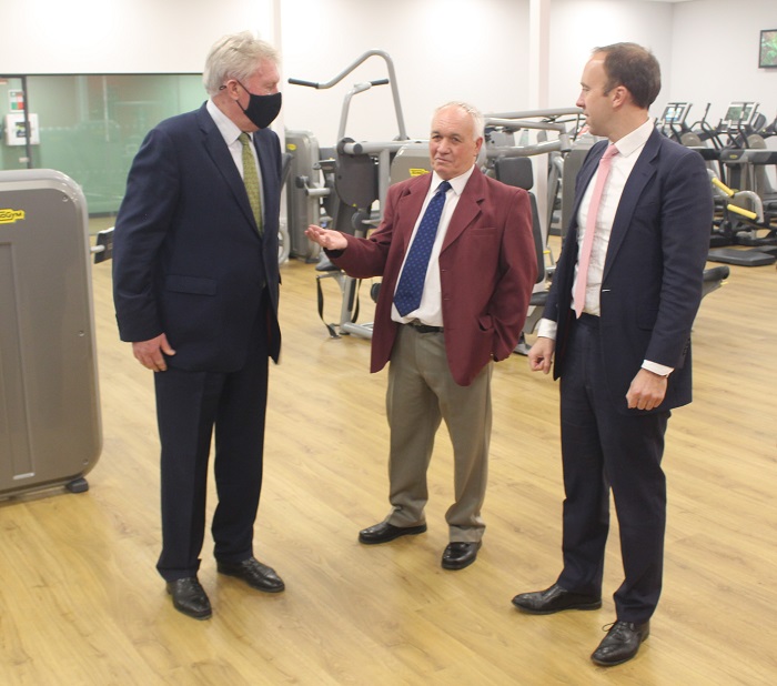 The gym at the Brandon Leisure and Health Hub - customer Colin Aldrich talks to Cllr John Griffiths, Leader of West Suffolk Council and MP Matt Hancock