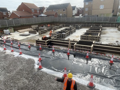 Cllr Frank Stennett visited the site of the Marham Park shop to see how the build is progressing. icon