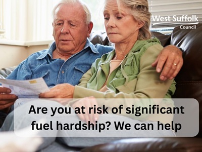 The text reads "Are you at risk of significant fuel hardship? We can help." The image show a couple on a sofa looking worriedly at a bill icon