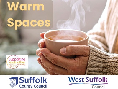 The image shows hands holding a steaming hot drink. The text reads Warm Spaces. The Supporting Each Other cost of living, Suffolk County Council and West Suffolk Council logos feature.