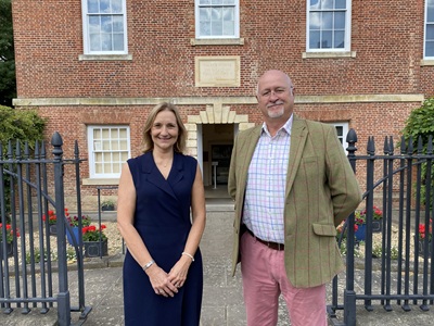 Tracey Harding and Cllr Ian Shipp outside Palace House, Newmarket icon