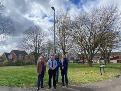 Image of councillors standing near a streetlight in Mildenhall